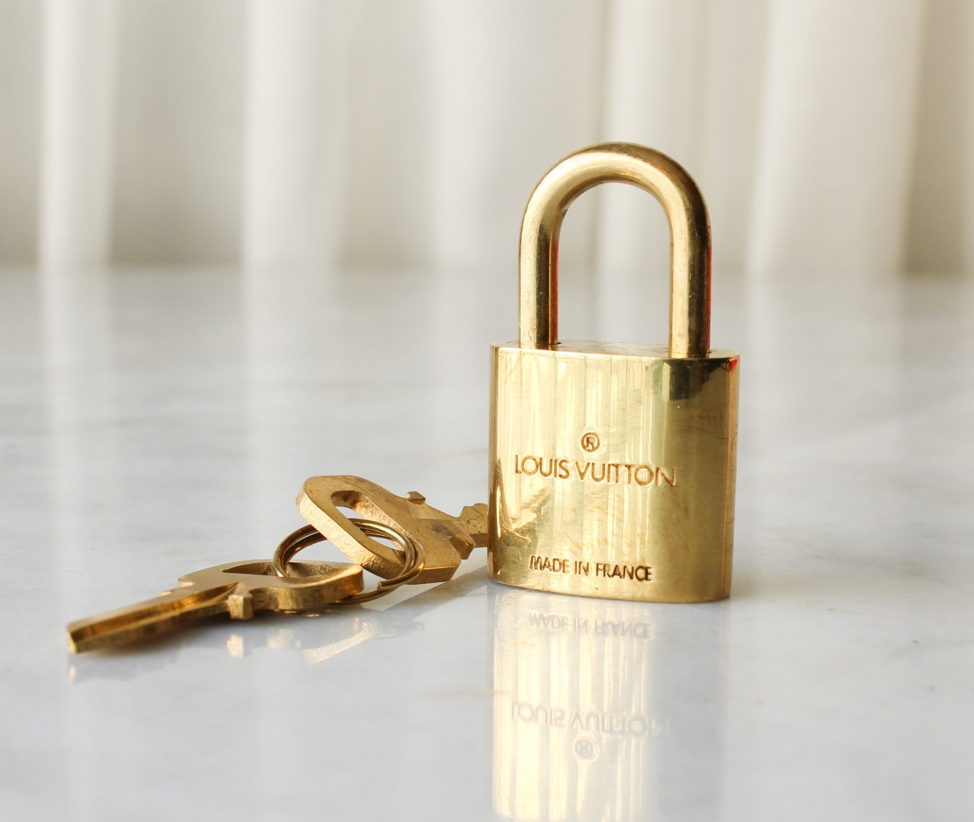 louis vuitton bag lock
