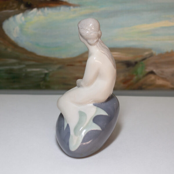 Bathing Beauty Mermaid Sitting On Rock Germany