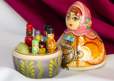 wood doll with ornaments