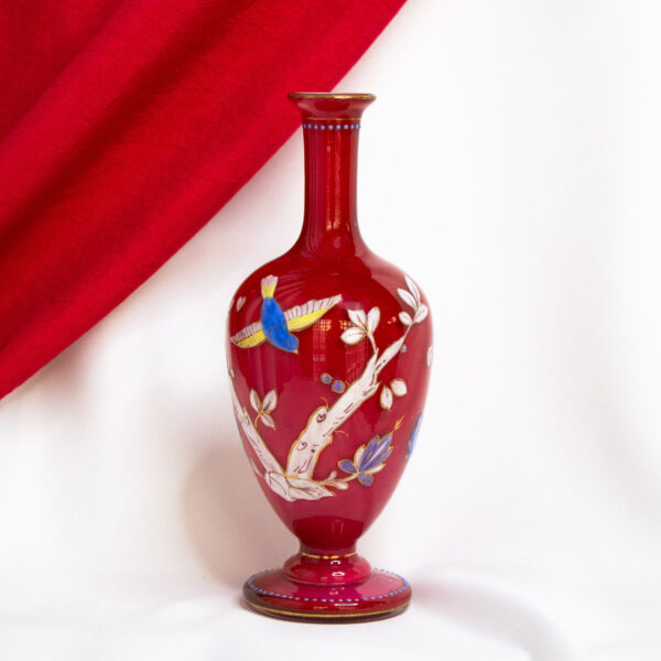 Red Glass Vase With Branches and Birds