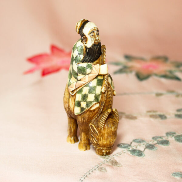 Japanese Netsuke Man Riding An Ox