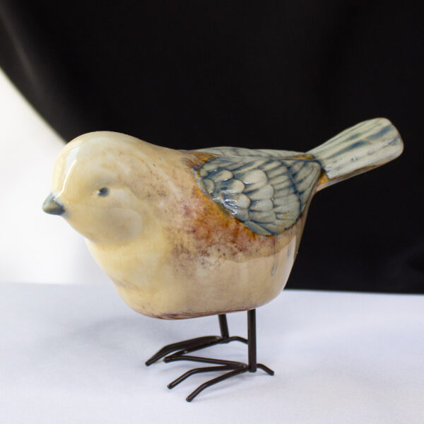 Vintage Stoneware Bird With Detailed Feathers and Metal Feet